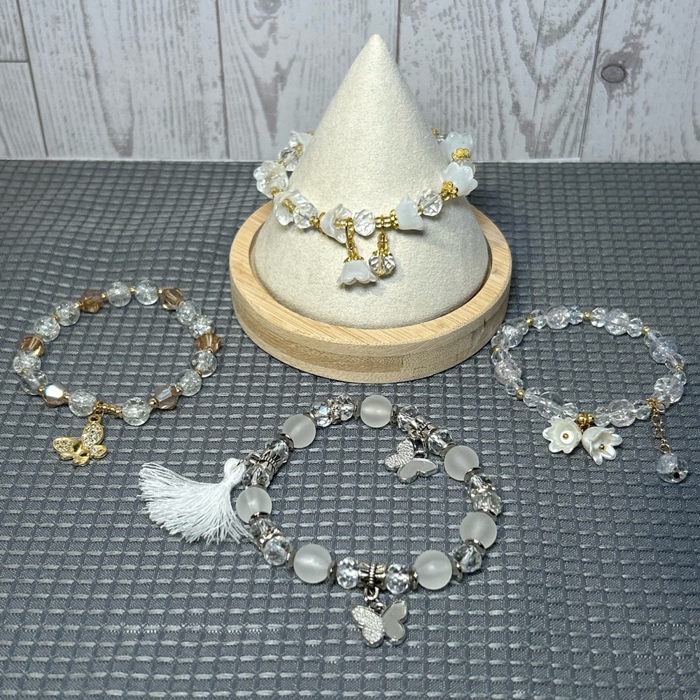 Set of Beaded Bracelets with Charms